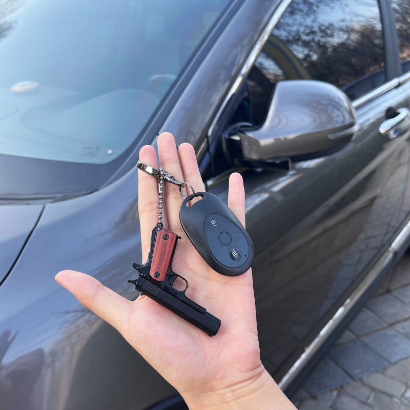 Mini Gun Keychain: The Perfect Gift for Men, Collectors, and Gun Enthusiasts