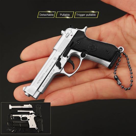 The Mini Gun Keychain: Silver Beretta Keychain for Collectors and Everyday Use