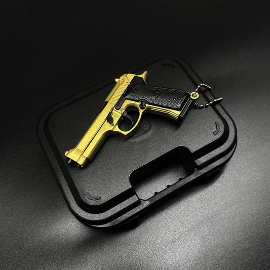 Handmade Excellence: The Luxury of the Gold Beretta Mini Gun Keychain